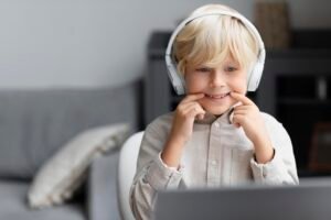 adorable-little-boy-doing-online-session-speech-therapy